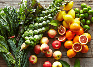 a group of fruits and vegetables on a wood surface Healthy Weight Loss Diets Sheffield